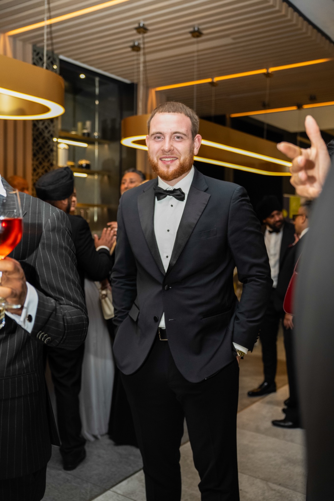 Dawid Guja in black tie at an industry awards event